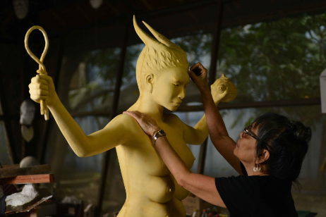 Agnes Arellano working on one of her pieces for Art Fair Philippines 2017